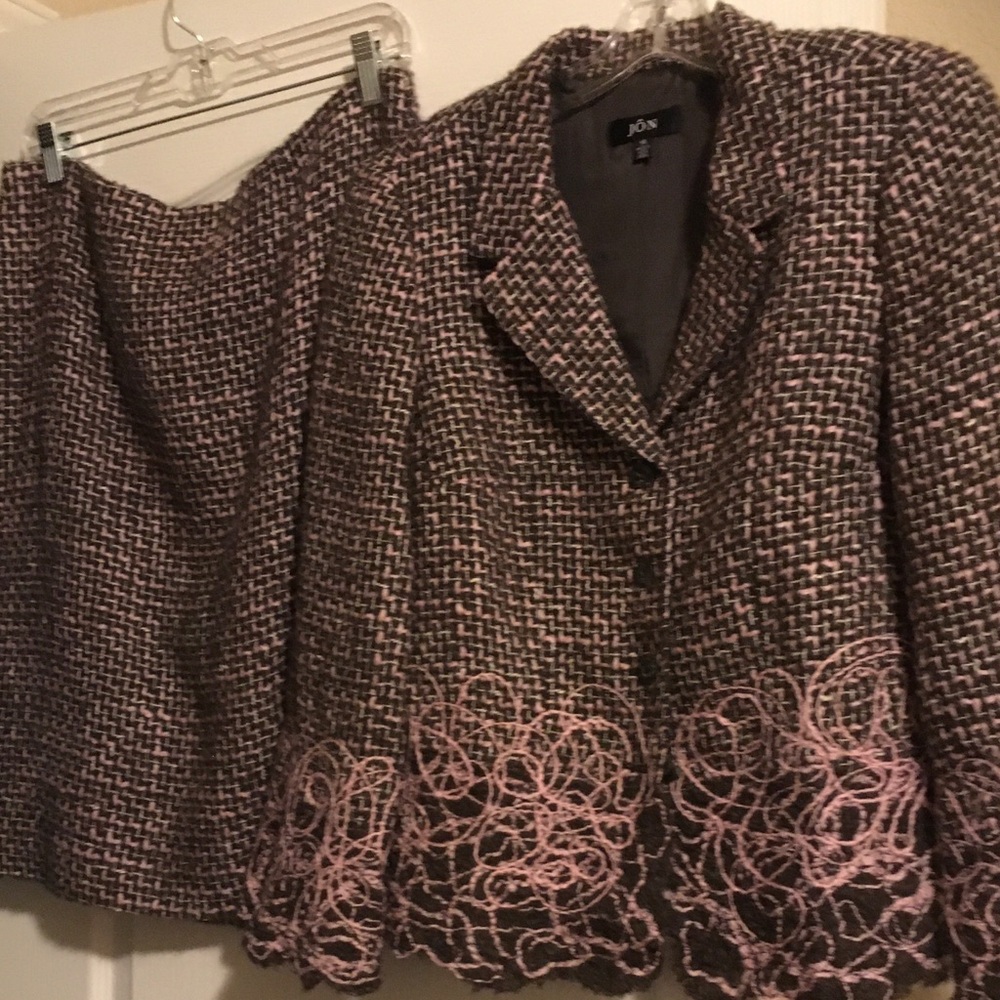 Ladies two piece skirt suit with detailed hem jacket